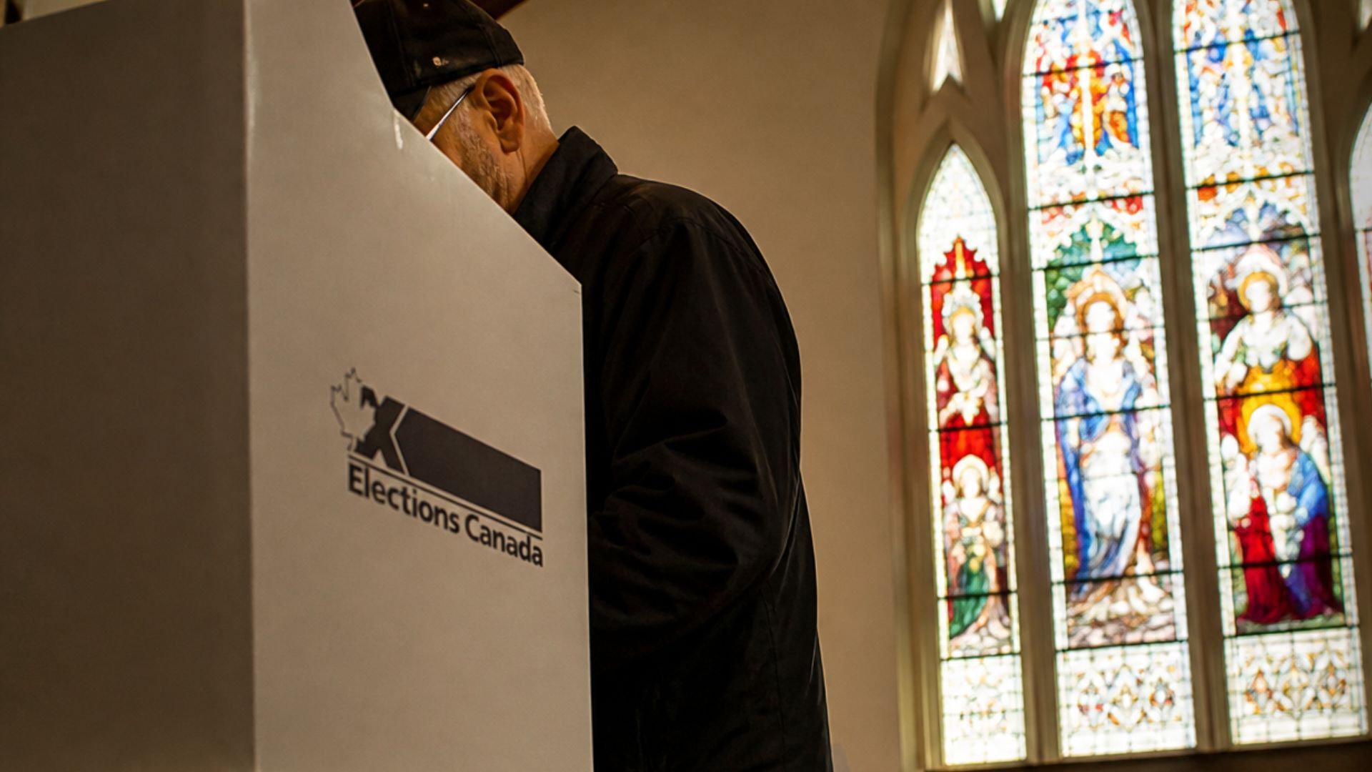 Man voting in a church